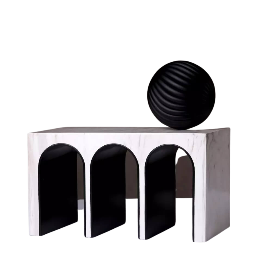 Triple Arched object made from resin and marble. A ball object sits on the top of the sculpture.