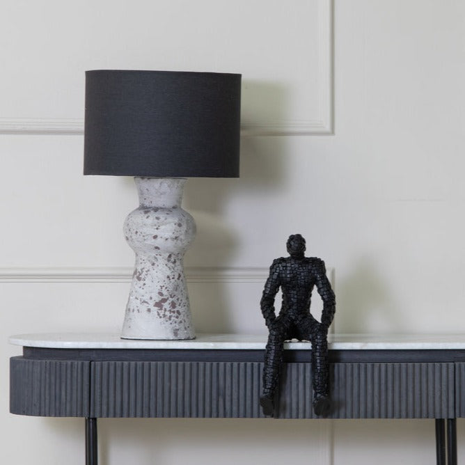 Carlos Human sculpture on a hallway table